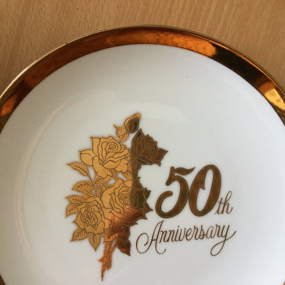 Saji fine china Japan 50th anniversary plate gold edge & gold flowers